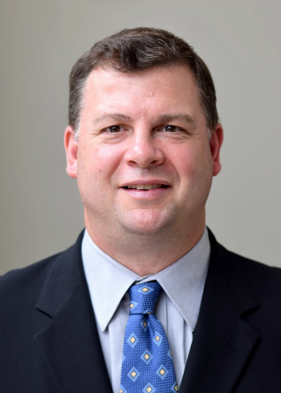 John H. Scuras, Managing Director & Founder